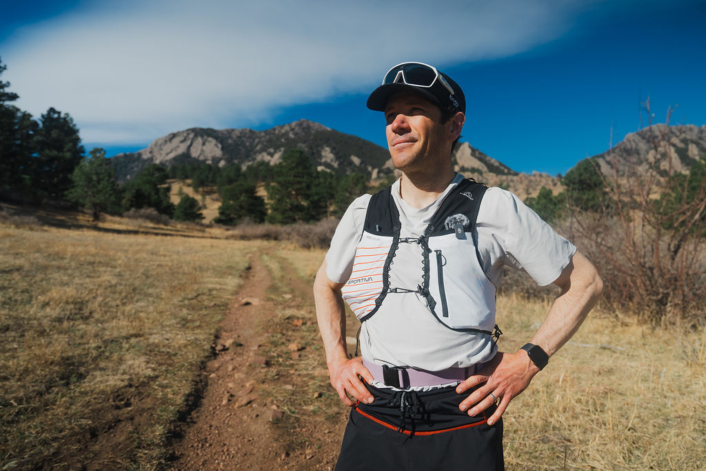 John Tribbia on Shanahan Trail — Prodigio 2 in La Sportiva kit with Flatirons behind
