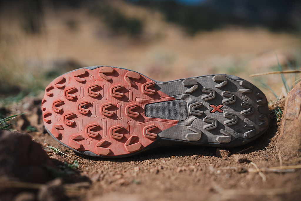 Prodigio 2 outsole — dual-compound FriXion lug pattern on trail